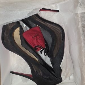 Christian Louboutin Black Heels with Red Soles